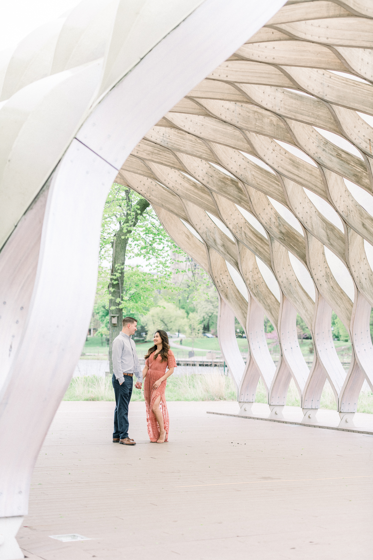 Engaged couple in the middle of the in the middle of the honeycomb at Lincoln Park Chicago