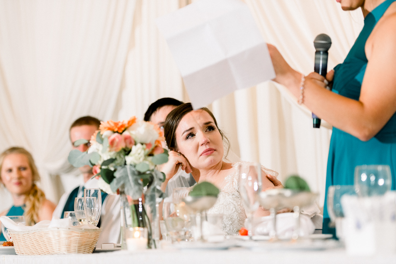 Bride cries while her best friend is giving her toast