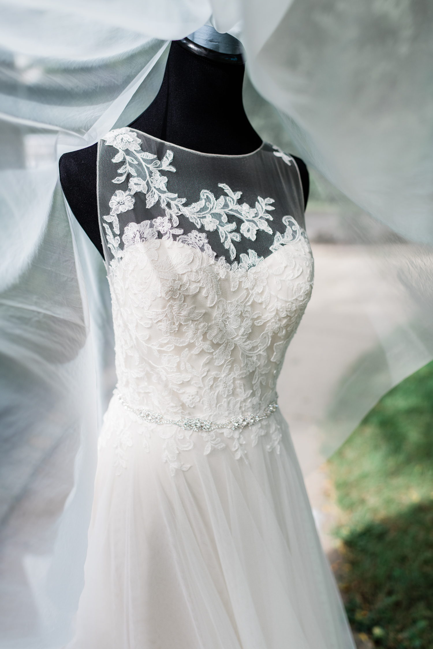 White lacey wedding dress and a veil
