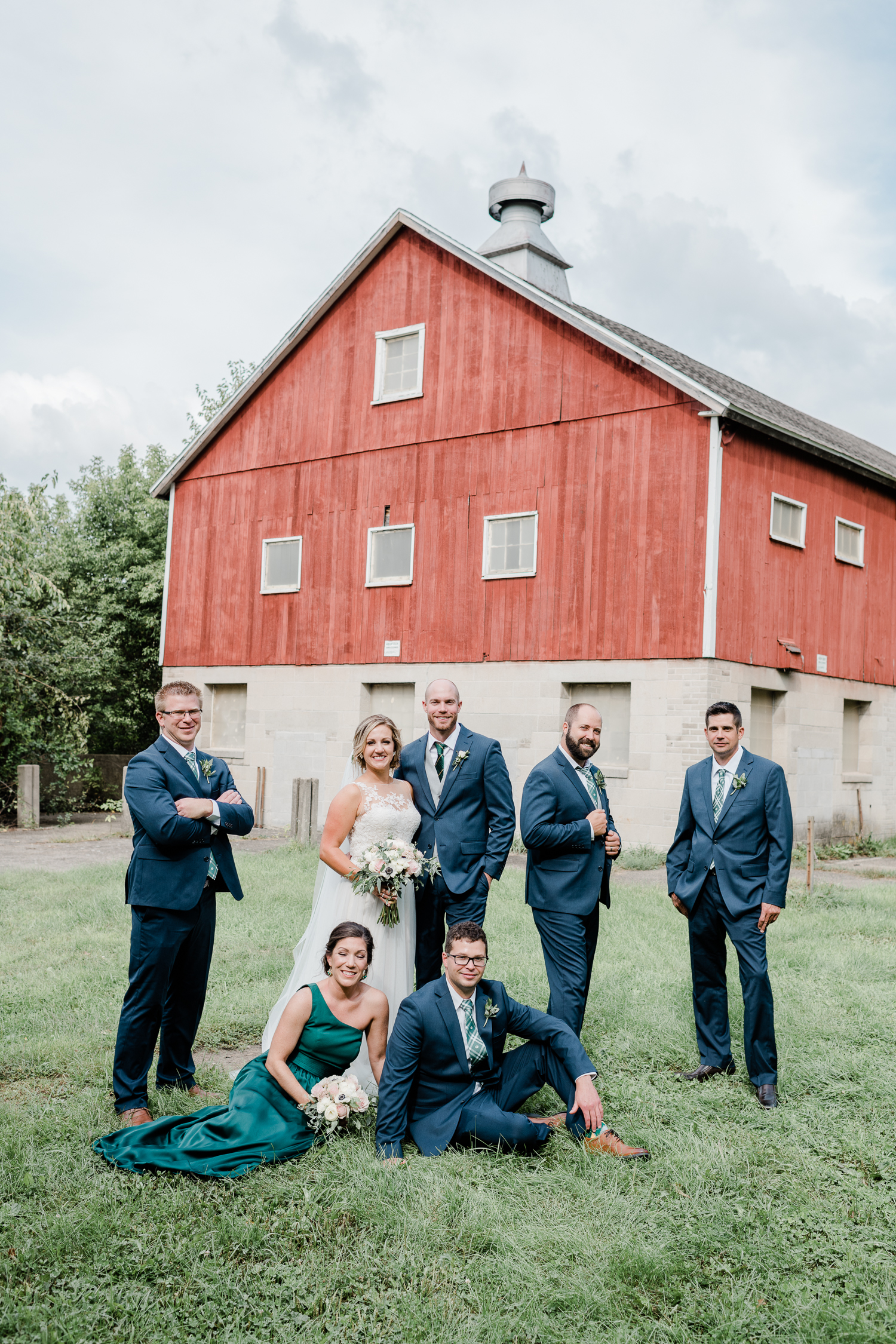 Bridal party outside the red barn