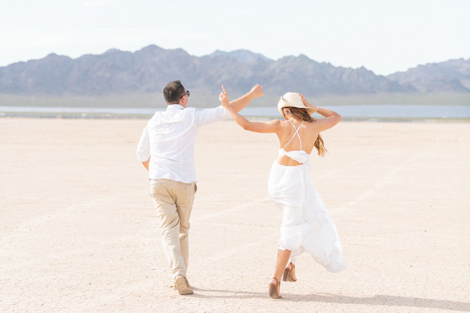 Engaged couple dance away on a desert in Nevada
